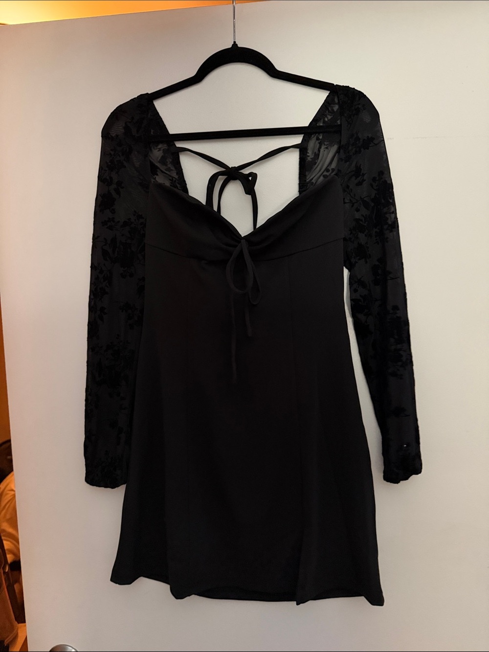 Black Long-Sleeve Mini Dress with Tie-Back Detail